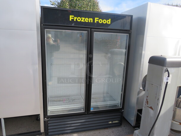 One True 2 Door Glass Display Freezer With Racks On Casters. 115/208-230 Volt. 1 Phase. Model# GDM-49F-LD. - Image 2 of 3