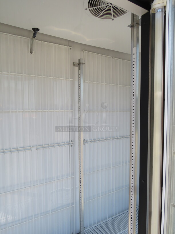 One True 3 Door Glass Display Freezer With 12 Racks. Model# GDM-72F-LD. 115/208-230 Volt. 1 Phase. 78X30X79.  - Image 4 of 4