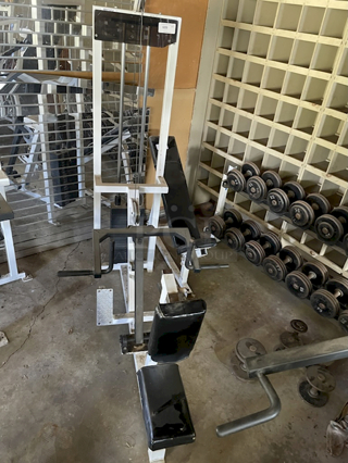 Complete Barbell Weight Set W/ Rack. Pictured Behind Machine.