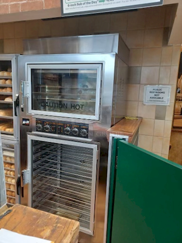 EXTREMELY WELL TAKEN CARE OF!! LIKE NEW! Nu-Vu® Model: Sub-123 Commercial Baking Oven and Proofer Combo Unit.
208v 3ph Oven/Proofer On Commercial Casters. Lighted Interior; Holds (3) Racks For Oven & (9) Racks For Proofer; (12) Racks Included;. 33½"H X 26"W X 20"D (Bottom Proofer). 3" Heavy Duty Lock-Able Casters; Lighted Interior;. (Nsf) & (Ul) Certified. 
Overall Condition and Functioning = 9/10 . 

Tested. Observed In Perfect Working Order.

Overall Dimensions:
36 1/8"x28 5/8"x77-3/4"

Proofer Interior:
Left to Right: 26 1/4" x Front to Back: 20 1/4" x Height: 33 1/2"

Oven Interior:
Left to Right: 26 1/4" x Front to Back: 20 1/4" x Height: 15"
 
 - Image 2 of 3