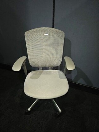 Contessa Teknion task chair. Grey in color and a nice used piece with a quality brand name! Measures 41” H x 26” W.  
