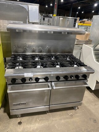American Range Commercial Natural Gas Powered 8 Burner Stove! With Raised Back Splash And Salamander Shelf! With 2 Oven Underneath! Metal Oven Racks! All Stainless Steel! On Casters!