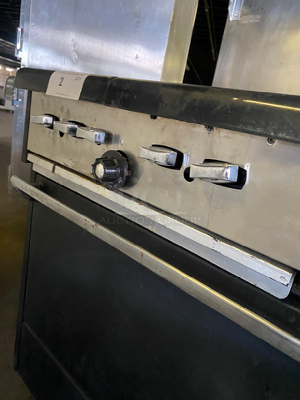 Commercial Natural Gas Powered 4 Burner Stove! With Built In Flat Top Grill! With Back Splash And Salamander Shelf! With Full Size Oven! Metal Oven Rack! With 2 Door Storage Area Underneath! All Stainless Steel! - Image 10 of 12