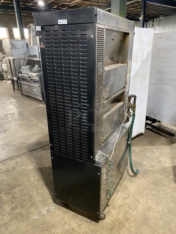 Nice! ROTISOL Heavy Duty Natural Gas Fired Chicken Rotisserie Machine! With Skewers! Model 975.5 Serial 7949! 220-240V/60Hz/1 Phase! On Commercial Casters! 
 - Image 3 of 10
