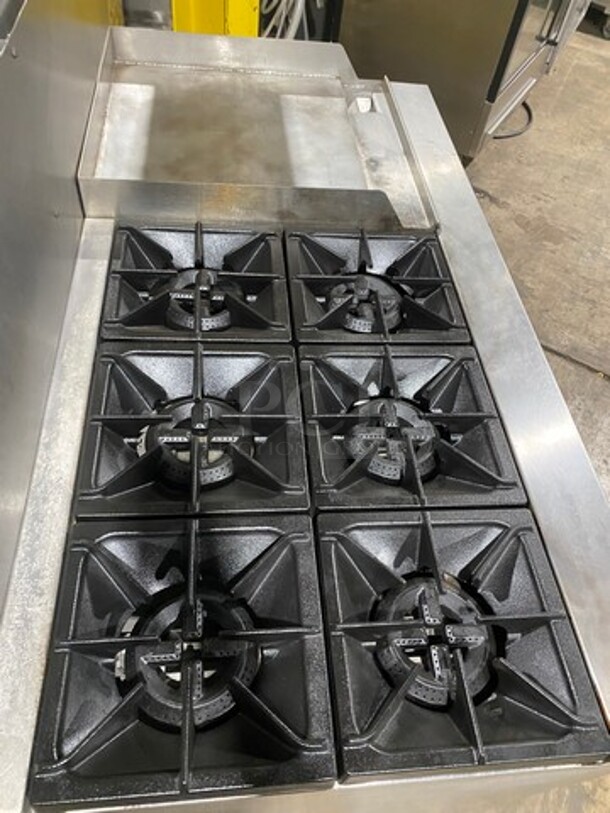 Patriot Commercial Natural Gas Powered 6 Burner Stove With Flat Griddle! Flat Griddle Has Side Splashes! With Raised Back Splash! With 2 Oven Underneath! Metal Oven Racks! All Stainless Steel! On Casters! Model: FMGR6024GNG SN: 17035100006 - Image 5 of 12