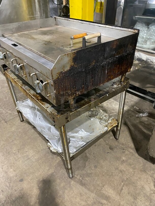 GREAT! Star Commercial Natural Gas Powered Flat Griddle! On Equipment Stand! With Back & Side Splashes! With Underneath Storage Space! With Weighted Wood Handle Meat/Hamburger Press! On Legs! WORKING WHEN REMOVED! - Image 3 of 8