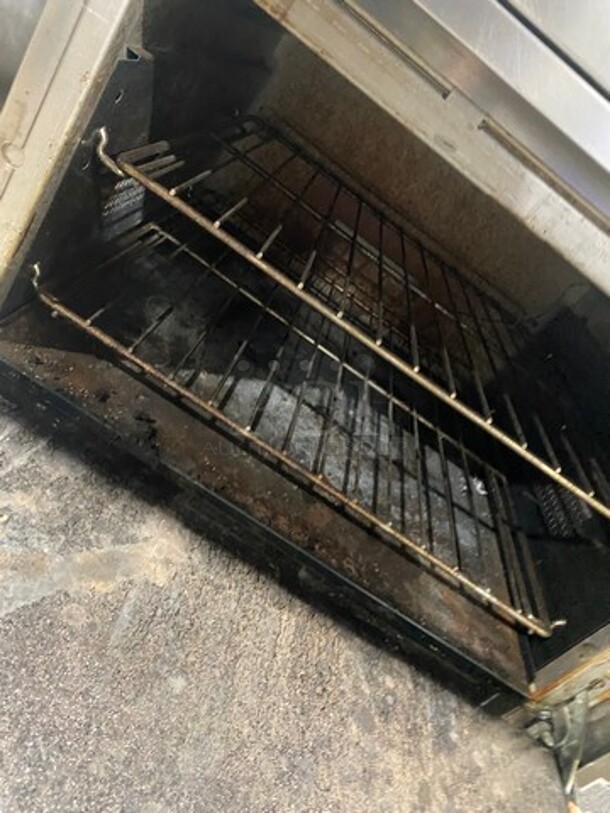 Vulcan Commercial Natural Gas Powered 12 Burner Stove! With Raised Back Splash And Salamander Shelf! With 2 Oven Underneath! All Stainless Steel! On Casters! WORKING WHEN REMOVED! Model: G72SS1AA SN: 659011300 - Image 8 of 11