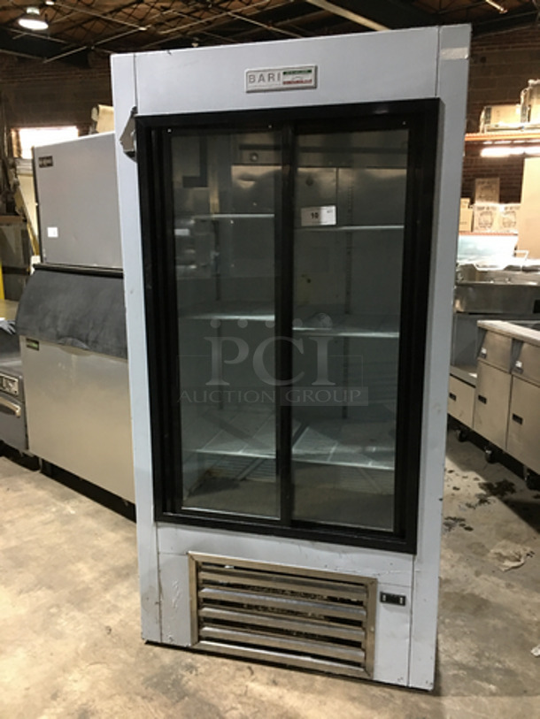 WOW! LATE MODEL! 2019 Coolman Reach In Refrigerator/ Freezer Merchandiser! With 2 Glass Sliding Doors! With Poly Coated Racks!  Model: CUST-40SG SN: 0111319 120V 60HZ 1 Phase