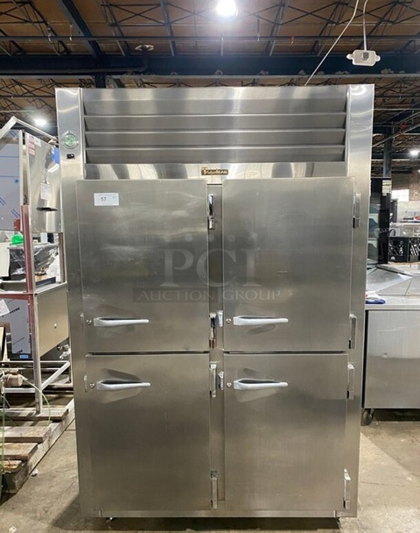 NICE! Traulsen Commercial 4 Split Door Reach In Cooler! With Poly Coated Racks And Built In Pan Racks! All Stainless Steel! On Casters! Model: AHT232NUT122 SN: T722770L99 115V 1 Phase - Item #1113789