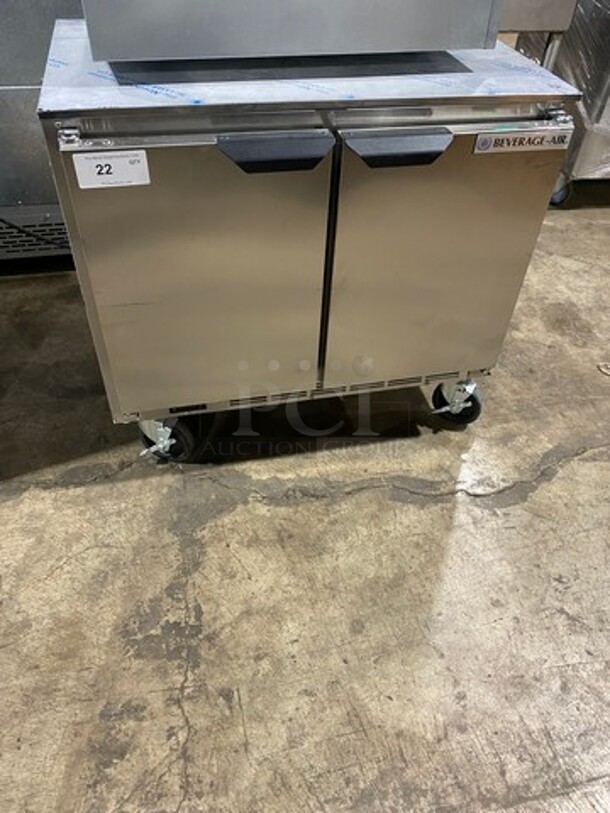SWEET! NEW! OUT OF THE BOX! Beverage Air Commercial 2 Door Lowboy/Worktop Cooler! With Poly Coated Racks! All Stainless Steel! On Casters! Model: UCR34HC SN: 13402181 115V 60HZ 1 Phase