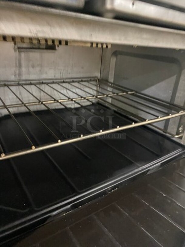 Sunfire Commercial Natural Gas Powered 6 Burner Stove! With Raised Back Splash And Salamander Shelf! With Oven Underneath! All Stainless Steel! On Casters! Working When Removed!  - Image 8 of 10