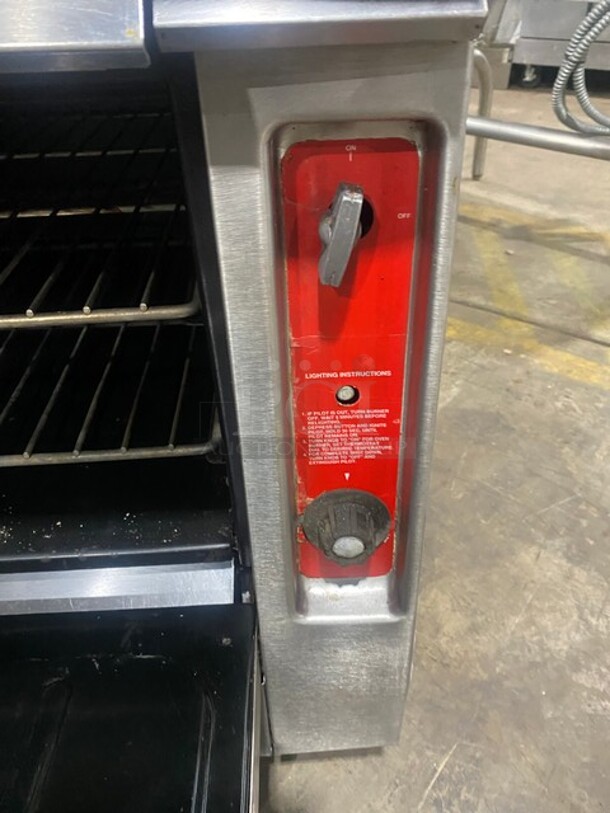 Vulcan Commercial Natural Gas Powered 4 Burner Stove! With Raised Back Splash Double shelf! With Oven Underneath! All Stainless Steel! On Casters! - Image 8 of 10