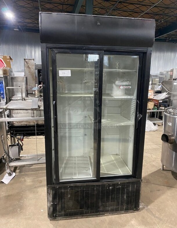 True Commercial 2 Sliding Door Reach In Refrigerator Merchandiser! With View Through Doors! With Poly Coated Racks! Model: GDM33 SN: 13089041 115V 60HZ 1 Phase