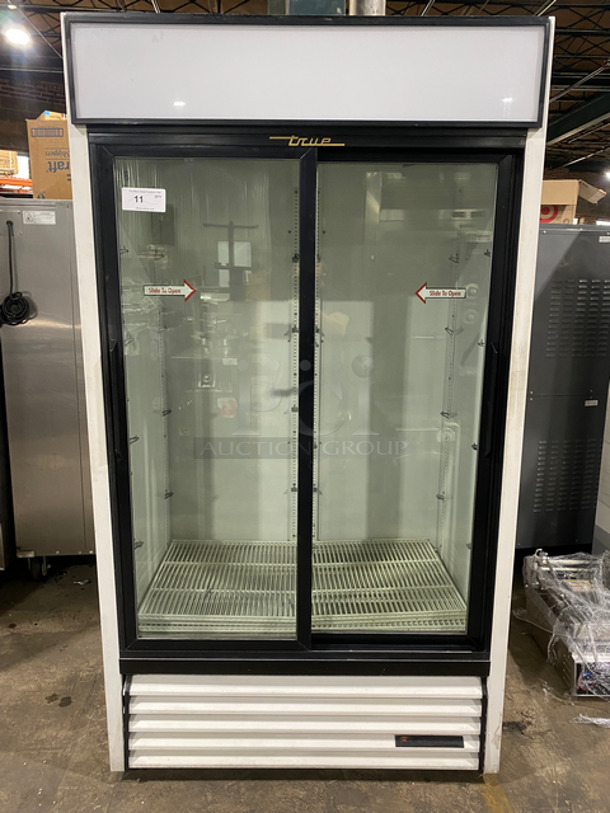 True Commercial 2 Door Reach In Refrigerator Merchandiser! With View Through Sliding Doors! With Poly Coated Racks! Model: GDM37 SN: 5253908 115V 60HZ 1 Phase