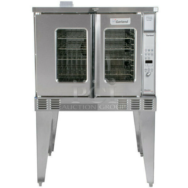 BRAND NEW! 2021 Garland Model MCO-GS-10 Stainless Steel Commercial Natural Gas Powered Full Size Convection Oven w/ view Through Doors, Metal Oven Racks and Thermostatic Controls. Stock Picture Used For Gallery. Does Not Include Legs. 60,000 BTU. 38x38x33
