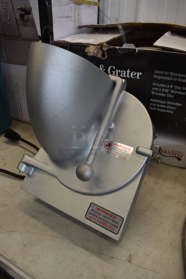 BRAND NEW IN BOX! Avantco Model 177MX20SHRDR Metal Commercial Pelican Head w/ Grating Blade. Unit Was Only Used a Few Times as a Demonstration at Trade Shows. 12x12x16