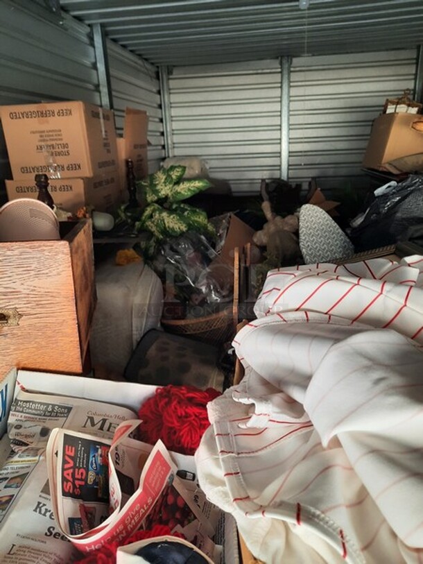 ALL ONE MONEY! Lot of Entire Contents of Storage Unit #29. Unit Size: 10 x 20. Unit Appears to Contain: Dressers, Bookshelves, Box Spring & Mattress, Wooden Bed, Couch, Chairs, Tables, Fan, Heaters, Bottle of Buttons, Longaberger Baskets, Lights, Mirror, Ironing Board, Rugs, Suitcases, Trashcan, Keurig, Blankets, Clothes, Shoes, Kerosene Heater, Large Stuffed Giraffe, Fake Plants, Bags, Totes & Boxes. Cleaning Deposit of $100 per Unit Paid on Pickup Day. Winner Has 7 Days From Close of Auction to Remove Items. All Items Must Be Removed and Unit Must Be Broom Swept to Get Cleaning Deposit Returned. Invoice and Cleaning Deposit Must Be Paid In Full by 4:00pm Tuesday, March 7th. Unit Must Be Cleared Out By 4:00pm Monday, March 13th. Please Come Into The Office To Settle Your Invoice and You Will Be Taken To Your Storage Unit for Cleanout. If You Plan To Clear Out Your Unit Saturday or Sunday You Need To Report To Our Office During The Week Before 4:00pm To Gain Access To Your Unit As Our Office Is Closed On Weekends. - Image 12 of 12
