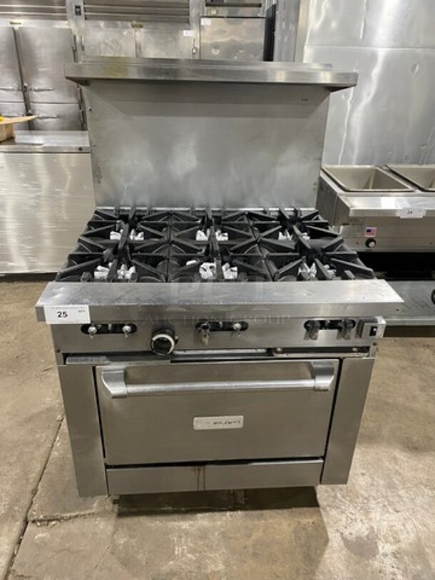 Garland Commercial Natural Gas Powered 6 Burner Stove! With Raised Back Splash And Salamander Shelf! With Oven Underneath! Metal Oven Rack! All Stainless Steel! On Casters!