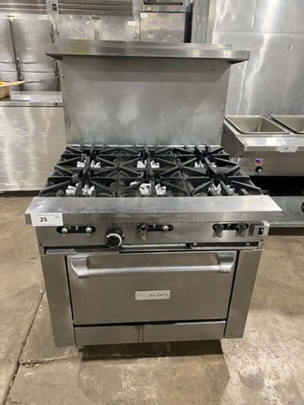 Garland Commercial Natural Gas Powered 6 Burner Stove! With Raised Back Splash And Salamander Shelf! With Oven Underneath! Metal Oven Rack! All Stainless Steel! On Casters! - Image 1 of 10