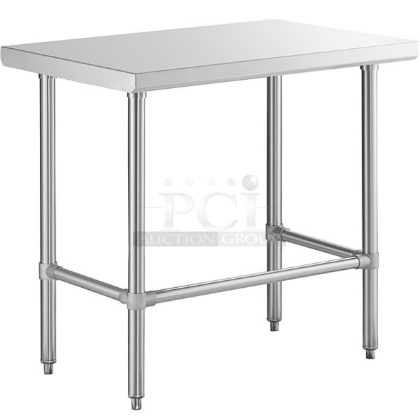 BRAND NEW SCRATCH AND DENT! Regency 600WTS24X36S Spec Line 24" x 36" 14-Gauge 304 Stainless Steel Commercial Open Base Work Table - Image 1 of 3