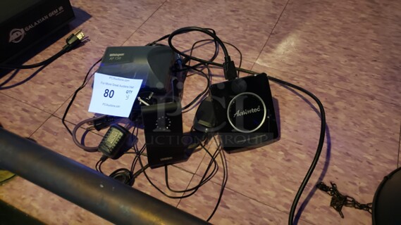 Lot Miscellaneous Electronics.
Actiontee Video Receiver, Uniden Camera, and Whisper AP150

Not tested 

(Location 2)