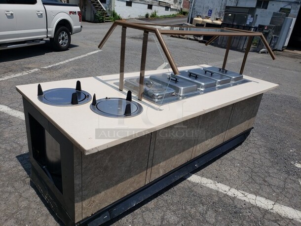 5 Well Mobile Food Cart w/ Enclosed Base, Sneeze Guard, and 2 Dish Dispensers! On Casters! Drain pipes need to be replaced. - Image 1 of 11