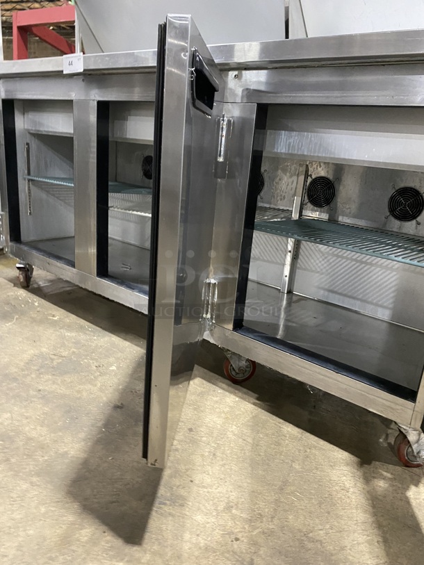 NICE! LEADER All Stainless Steel 3 Door Sandwich/Salad Prep Table Refrigerator! W/ Stainless Steel Top Shelf And Poly Coated Racks!  Shelf!  On Casters!  Model ESLM72S/C Serial NQ11M0903N 115V/60Hz/ - Image 6 of 10