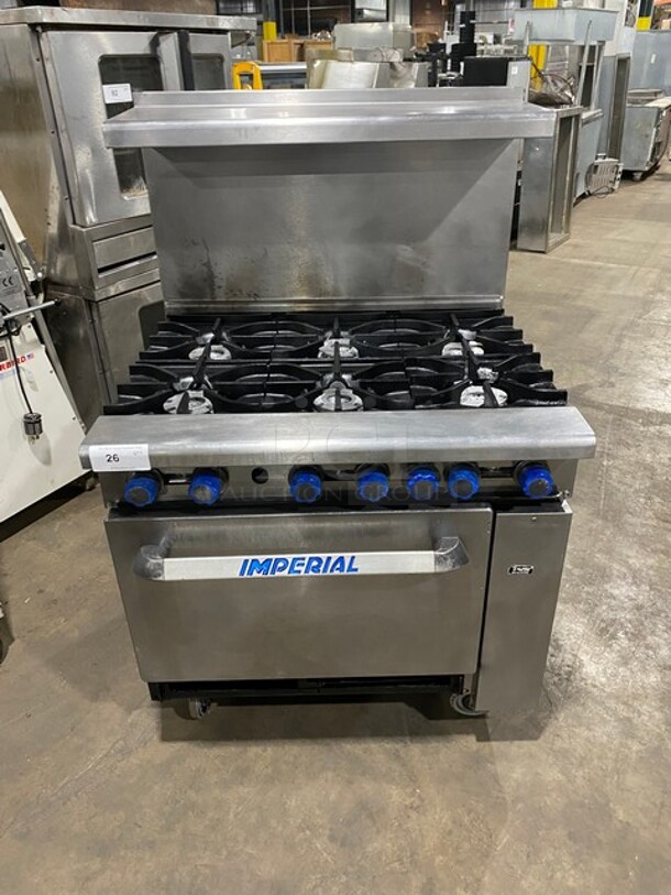 Imperial Commercial Natural Gas Powered 6 Burner Stove! With Raised Back Splash And Salamander Shelf! With Oven Underneath! All Stainless Steel! On Casters!