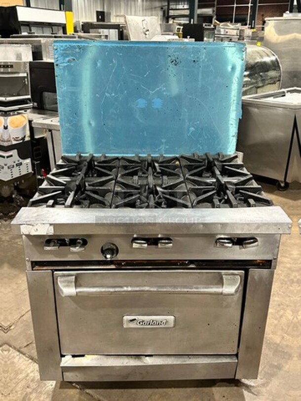 Garland Commercial Natural Gas Powered 6 Burner Stove! With Raised Back Splash! With Oven Underneath! Metal Oven Rack! All Stainless Steel! On Casters! - Image 10 of 10