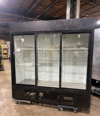 True 3 Sliding Door Cooler Merchandiser! With Poly Coated Racks! Model GDM69 Serial 11920903! 115V 1 Phase!