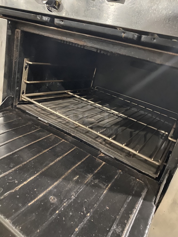 Garland Commercial Natural Gas Powered 6 Burner Stove! With Raised Back Splash! With Oven Underneath! Metal Oven Rack! All Stainless Steel! On Casters! - Image 7 of 9