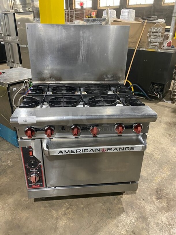 American Range Commercial Natural Gas Powered 6 Burner Stove! With Backsplash! With Full Size Oven Underneath! All Stainless Steel! On Casters! - Image 1 of 10