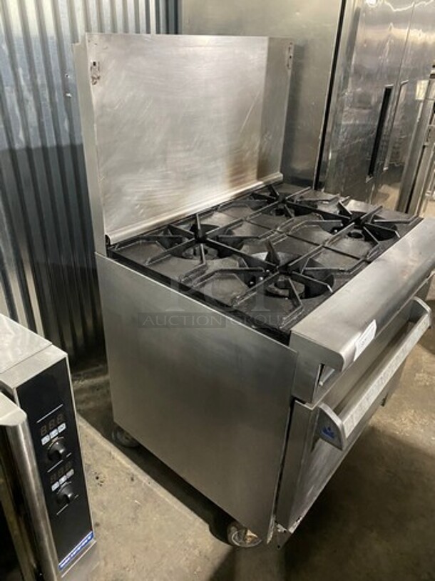 Imperial Commercial Natural Gas Powered 4 Burner Stove! With Raised Back Splash! With Oven Underneath! All Stainless Steel! On Casters! - Image 2 of 9