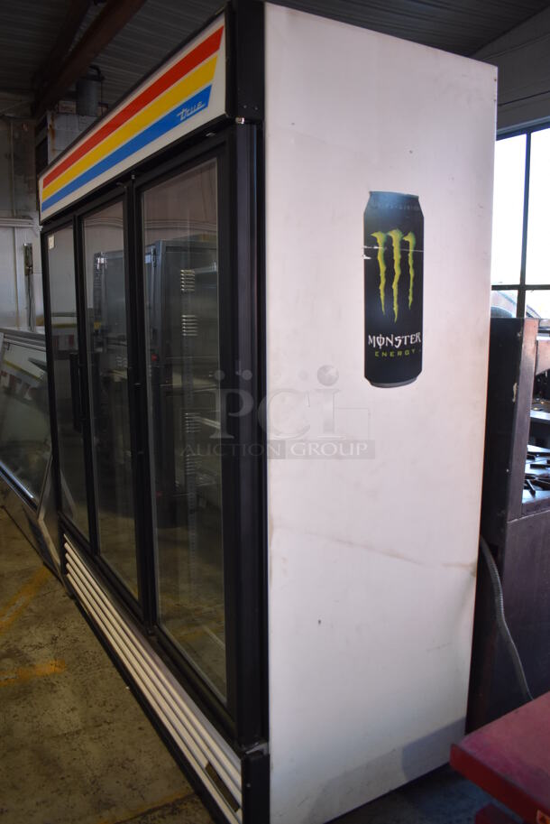 True GDM-72F Metal Commercial 3 Door Reach In Freezer Merchandiser w/ Poly Coated Racks. 115/208/230 Volts, 1 Phase. 78x32x82 - Image 3 of 8