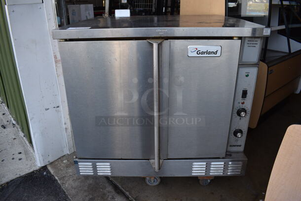 2015 Garland Sunfire SCO-GS-10S Stainless Steel Commercial Natural Gas Powered Full Size Convection Oven w/ Solid Doors, Metal Oven Racks and Thermostatic Controls. 38x42x32