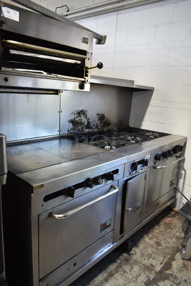 Southbend Stainless Steel Commercial Natural Gas Powered 6 Burner Range w/ Flat Top Griddle, 2 Ovens, Cheese Melter and Back Splash on Commercial Casters.  - Image 1 of 9