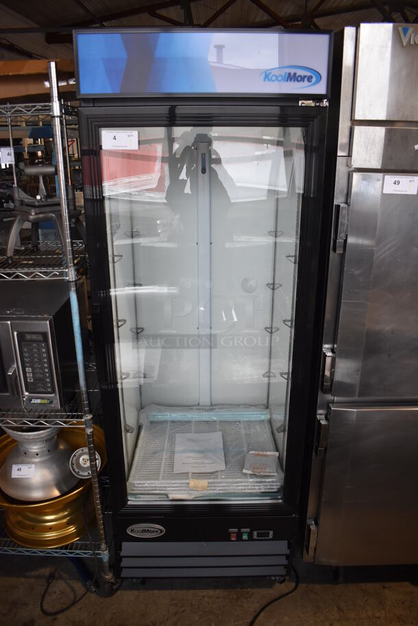 BRAND NEW SCRATCH AND DENT! KoolMore MDR-1D-23C Metal Commercial Single Door Reach In Cooler Merchandiser w/ Poly Coated Racks on Commercial Casters. 115 Volts, 1 Phase. 28x33.5x83. Tested and Working!