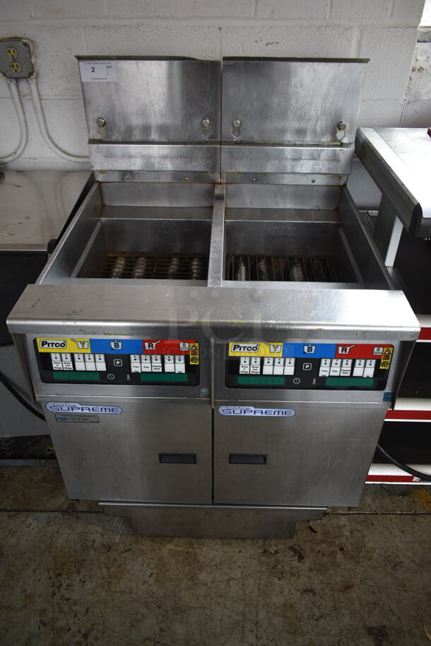 2015 Pitco Frialator Stainless Steel Commercial Floor Style Solstice Supreme Natural Gas Powered Floor Style Double Bay Deep Fat Fryer w/ Filtration System on Commercial Casters. 80,000 BTU.