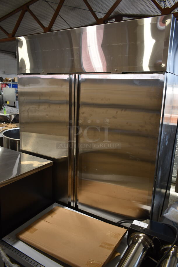 BRAND NEW SCRATCH AND DENT! 2022 Delfield GAHPT2-S Stainless Steel Commercial 2 Door Reach In Pass Through Warmer w/ Poly Coated Racks on Commercial Casters. 115 Volts, 1 Phase.  - Image 8 of 9