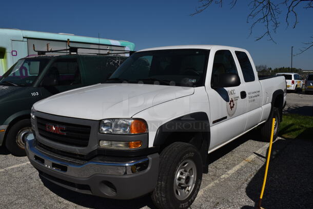 2005 GMC Sierra 4x4 4 Door Pick Up Truck. Odometer Reads 71,513. VIN 1GTHK29U45E234117. Title In Hand. Vehicle Runs and Drive. See Lot #8 For Additional Pictures.