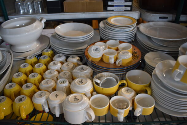 ALL ONE MONEY! Metro Lot of 5 Tiers of Various Items Including Poly Bin, Cutting Boards, Mugs, Plates and Saucers. Does Not Include Metro Shelving Unit - Image 5 of 11