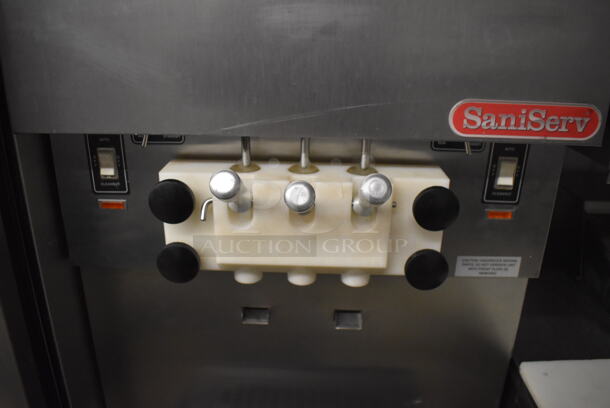 SaniServ W5273P Stainless Steel Commercial Floor Style Air Cooled 2 Flavor w/ Twist Soft Serve Ice Cream Machine on Commercial Casters. 208-230 Volts, 3 Phase. 24x23x59 - Image 4 of 9