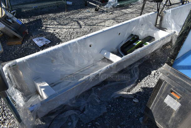 BRAND NEW SCRATCH AND DENT! Regency 600HSMSB1896 Stainless Steel Commercial Wall Mount Trough Style Sink.  - Image 1 of 4