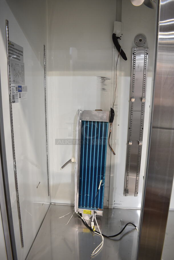 BRAND NEW SCRATCH AND DENT! 2023 Avantco 178A49FHC Stainless Steel Commercial 2 Door Reach In Freezer w/ Poly Coated Racks on Commercial Casters. 115 Volts, 1 Phase. Tested and Does Not Power On - Image 6 of 10