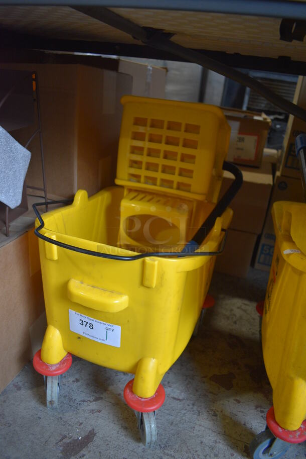Yellow Poly Mop Bucket w/ Wringing Attachment on Commercial Casters. 13x22x25 - Image 2 of 2