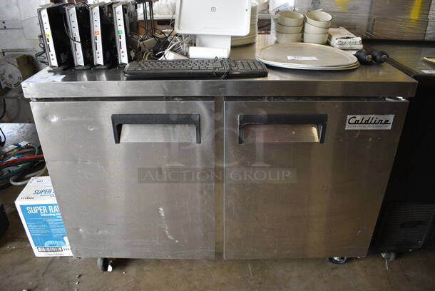 Coldline Model UUC48R-E-HC Stainless Steel Commercial 2 Door Undercounter Cooler on Commercial Casters. 115 Volts, 1 Phase. 48x30x35.5. Tested and Working!