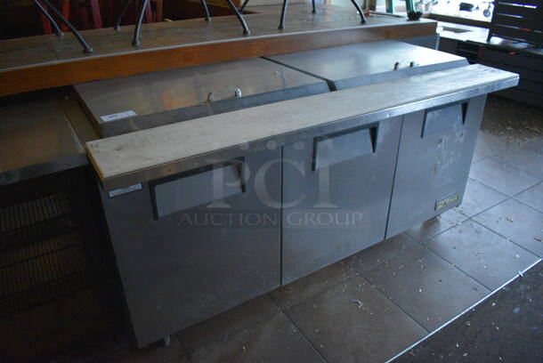 2011 True TSSU-72-30M-B-ST Stainless Steel Commercial Pizza Prep Table on Commercial Casters. BUYER MUST REMOVE. 115 Volts, 1 Phase. 72x34x38. Item Was in Working Condition on Last Day of Business. (Susquehanna Ale House) - Image 1 of 8