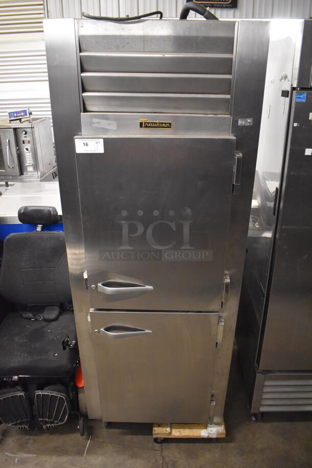 Traulsen AHT132WPUT-HHS Stainless Steel Commercial Two Half Size Door Reach In Pass Through Cooler. Missing 2 Legs. 115 Volts, 1 Phase. 30x35x83. Tested and Powers On But Does Not Get Cold