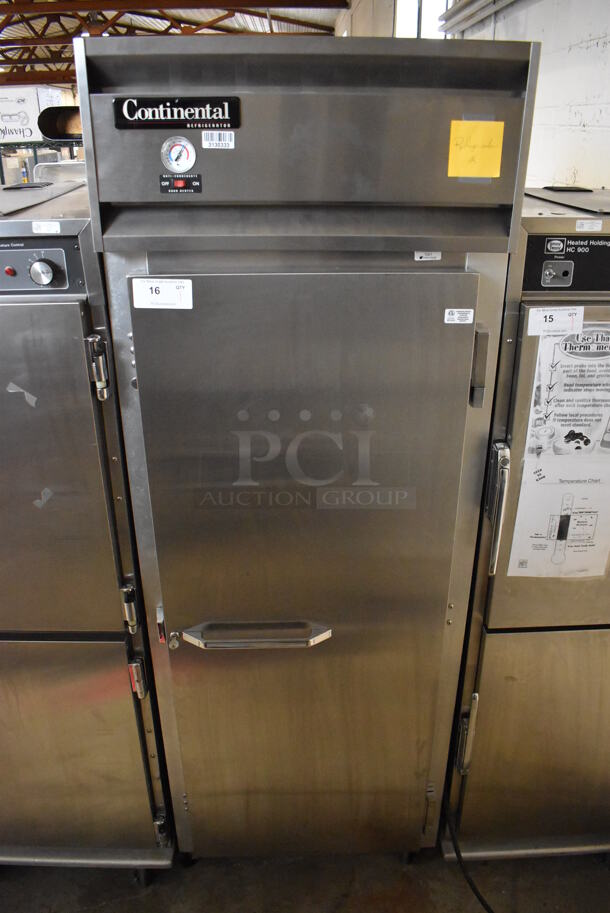 Continental 1RE Stainless Steel Commercial Single Door Reach In Cooler on Commercial Casters. 115 Volts, 1 Phase. 29x34x82. Tested and Working! - Image 1 of 6