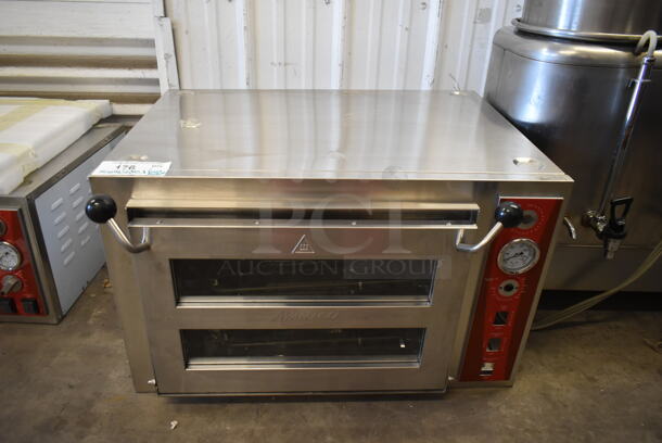 BRAND NEW SCRATCH AND DENT! Avantco 177DPO18DS Stainless Steel Commercial Double Deck Countertop Pizza/Bakery Oven w/ Cooking Stone. Missing Side Panels, Knobs and Cooking Stones. 240 Volts, 1 Phase.